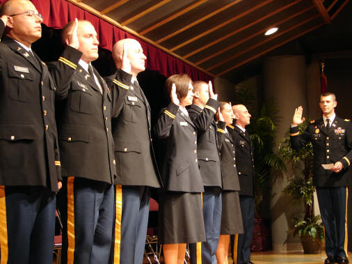 Col. Jeffery Helms, ASU professor of military science, administers the oath to the 2009 ASU graduates and newest second lieutenants in the United States Army (left to right): Patrick Byerly, Troy Cline, Travis Eddleman, Brandi Johnson, Nathan Smith, Megan Watters, and Jeremy Weeks.