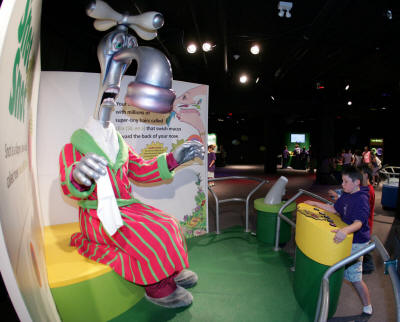 Nigel Nose-It-All, left, is one of the animatronic figures featured in "Grossology." Nigel, more than nine feet tall, makes a presentation on the functioning of the nose.