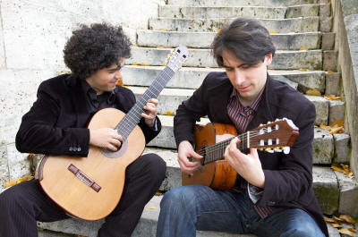 Judicael Perroy, left, and Jrmy Jouve, perform together as Paris Guitar Duet.