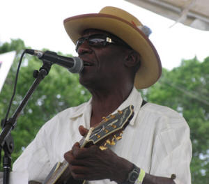 Jimmy 'Duck' Holmes performs at the 2007 Chicago Blues Festival. Photo credit: the Mississippi Folklife and Folk Artist Directory.