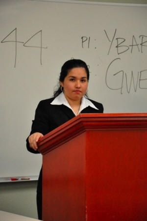 Lilia Pacheco, a sophomore political science and philiosophy major of Jonesboro, addresses the audience at Texas Wesleyan University School of Law.