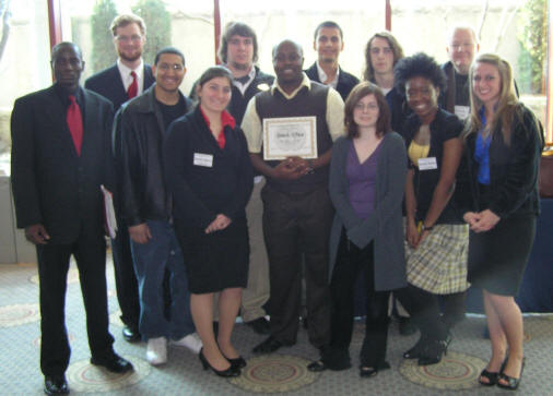 ASU's Model United nations group poses with their award in St. Louis.