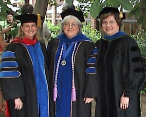 Dr. Elizabeth Young, left, Dr. Debbie Persell, center, and Dr. Susan Speraw, right, gather after Persell's graduation from the new Homeland Security Nursing program at UT-Knoxville.