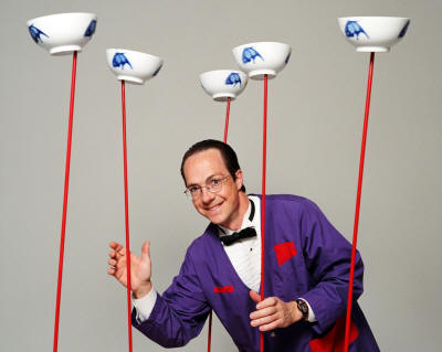 Science impresario Rhys Thomas teaches Newtonian physics by juggling and other feats of balance and coordination.
