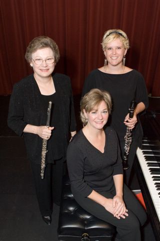 The University Trio of UT-Martin, Dr. Elaine Harriss,  Dr. Amy Simmons (standing, left to right), and Ms. Dana Easley, seated, will perform on Monday, Feb. 9 at 7:30 p.m. in ASU's Riceland Hall, Fowler Center.