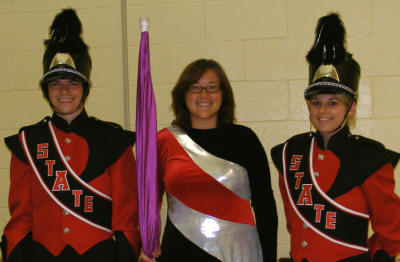 ASU band members (from left) Joshua Carter, Sunnie McArty, and Samantha Vaughn show off this year's new band uniforms.
