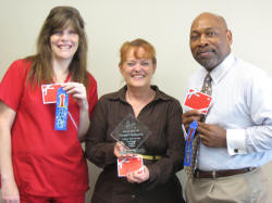 From left, Lori Gould, Vaneta Havey, and Dr. Lonnie Williams, all first-place winners in the Student Affairs bake-off competition.