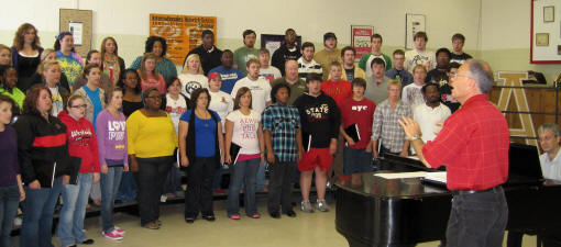 Members of the ASU Concert Choir rehearse under the direction of Dr. Dale Miller.