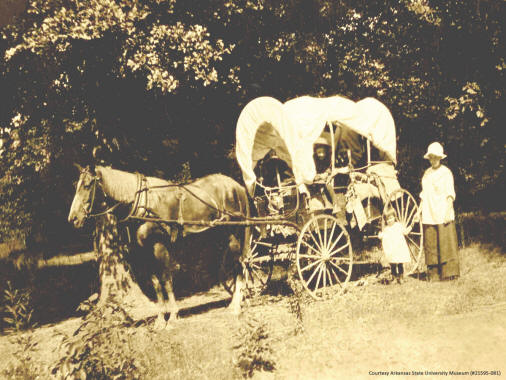 This photograph, from the collection of the ASU Museum, illustrates how a frontier family traveled in the early days of Arkansas.
