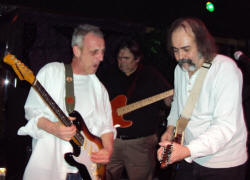 From left, Billy Lavender, Leo Goff, and Brad Webb perform.
