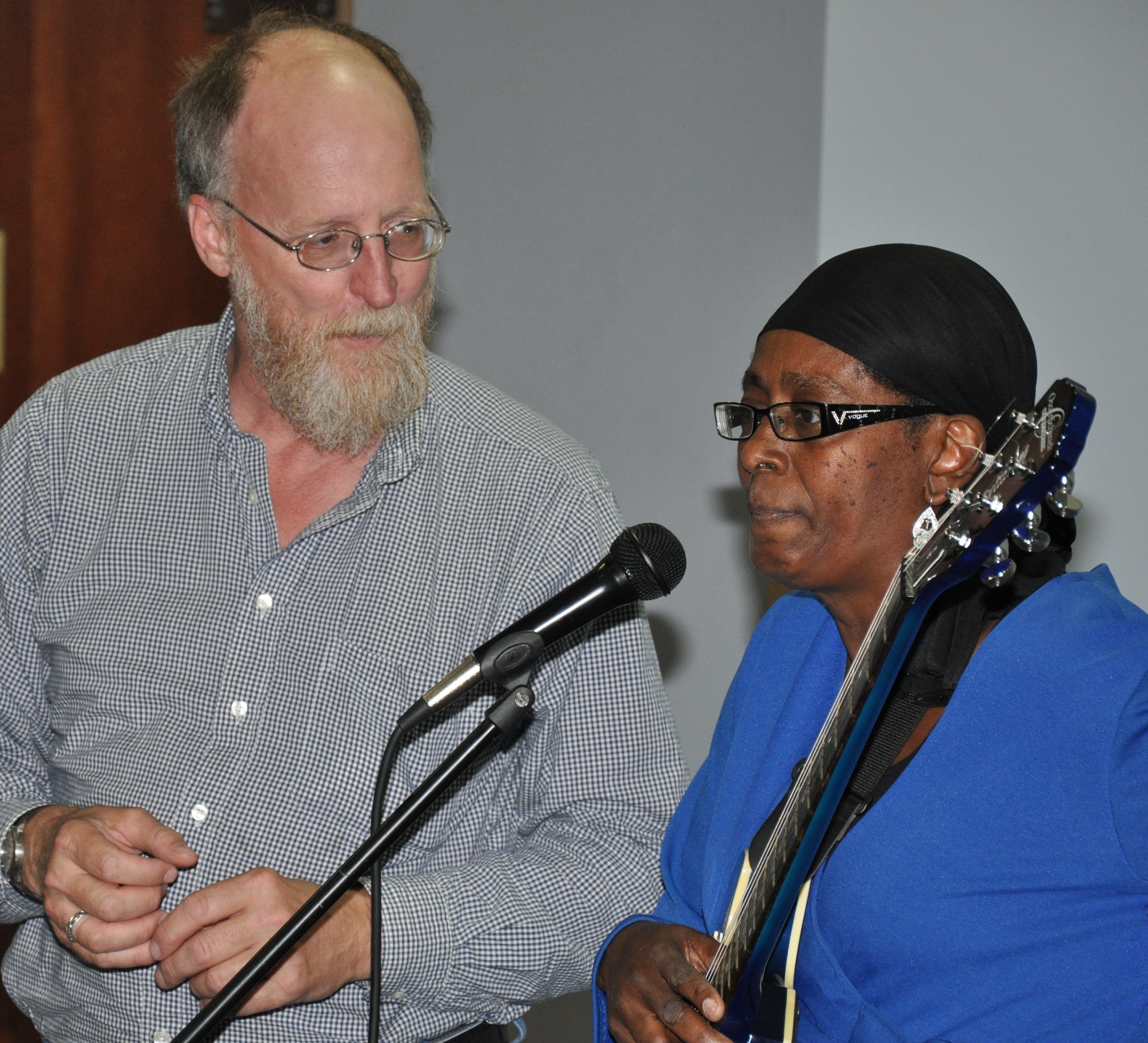 Dr. Mike Luster confers with Essie "the Blues Lady" Neal during a recent Blues in the Schools performance.