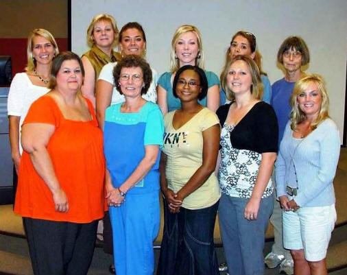 The first class of Master of Social Work students admitted to the regular standing part-time program at ASU--front row, Judy Perry, Robin Patten, Terri Clark, Pamela Diaz, Keena Waleszonia; back row, Maria Tinsley, Cecilia Alexander, Tera Quinto, Kristina Lloyd, Catherine Gilbow, Virginia Esposito.