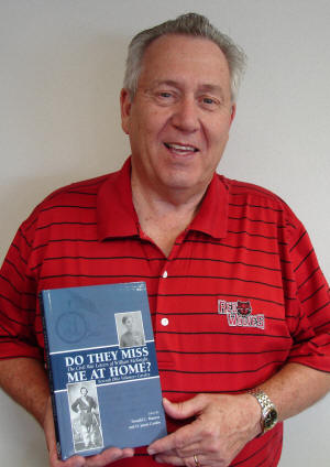 Dr. Don Maness holds a copy of his recently published book, "Do They Miss Me at Home?: The Civil War Letters of William McKnight, Seventh Ohio Volunteer Cavalry." Photo by Dr. Nancy Hendricks.