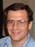 Dr. John E. Mello