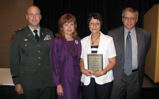 Lt. Col. Cary Shillcut, Joint Force Headquarters for the Arkansas National Guard, Linda Nelson, Arkansas district director of the U.S. Small Business Administration, SFC (retired) Barbara Lee, transition assistance advisor, Office of the Adjutant General, Army National Guard, and Herb Lawrence, center director, ASU Small Business Development Center, at the annual Arkansas Small Business Awards Luncheon.