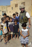 Amy Schlesing with Iraqi children