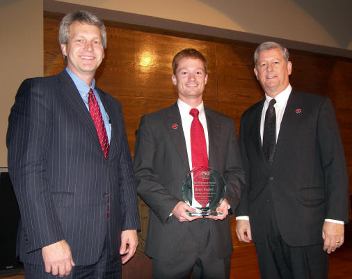 (From left) Len Frey, dean of College of Business; Ryan Beaird; Randy Luten, Crews and Associates in Little Rock.