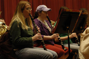 Wind Ensemble personnel Shayeeda Beard, left, of Cherokee Village and Amy Van Slyke of Hardy rehearse for the Wind Ensemble's "Reflections and Remembrances," a concert for Sharp County.
